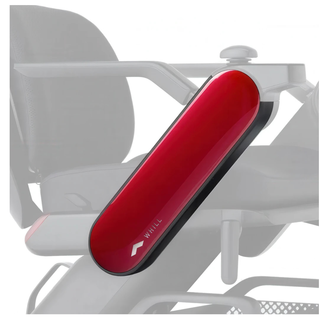 Close-up of glossy red Arm Covers for WHILL Model C2 Power Chairs with the WHILL logo on a gray chair; background and other accessories are faded out.